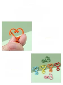 Detailed view of colorful heart-shaped metal lobster clasps for DIY jewelry making