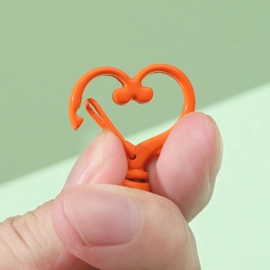 Orange heart-shaped swivel lobster clasp with 360-degree rotation for DIY keychains