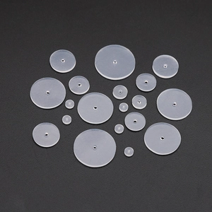 Macro detail of various sizes of translucent silicone ear piericng healing discs