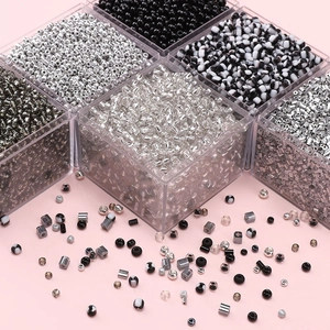 DIY black and silver glass seed bead set in transparent square storage boxes