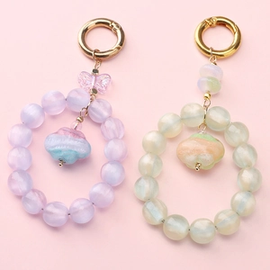 Macaron pastel gradient resin beads keychain with golden clasp and butterfly charm