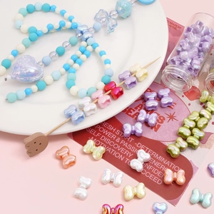Colorful iridescent bow and heart acrylic beads for DIY jewelry and bracelet making