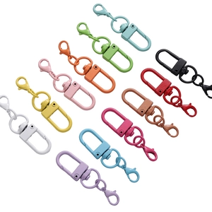 Close-up of colorful alloy lobster clasps with matte finish in twelve vibrant shades