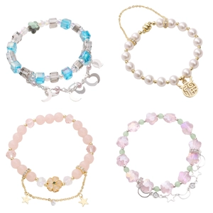 Braccialetti placcati oro con ciondoli a stella e conchiglia e perline colorate