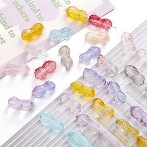 Detailed view of colorful peanut-shaped glass beads with intricate textures for jewelry DIY