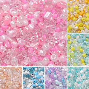 Detailed view of assorted 20g glass seed beads with transparent and matte finishes for DIY