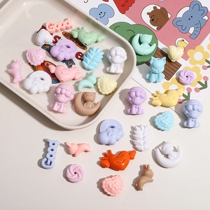Assorted colorful acrylic DIY beads including hearts, rabbits, and clouds for jewelry making