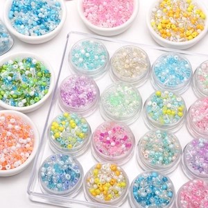 Colorful glass seed beads set in organizer box for DIY handmade jewelry crafting