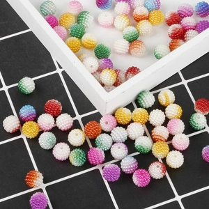 Close-up of 10mm textured ABS berry beads for DIY jewelry making in various vibrant colors