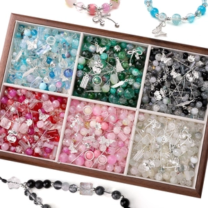 Mixed glass beads and alloy pendants DIY jewelry making kit in a wooden storage box