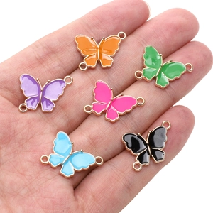 Colorful enamel butterfly charm connectors in six vibrant colors for DIY jewelry making