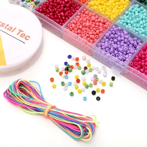 DIY jewelry making kit with 3mm glass seed beads and elastic strings in a storage box