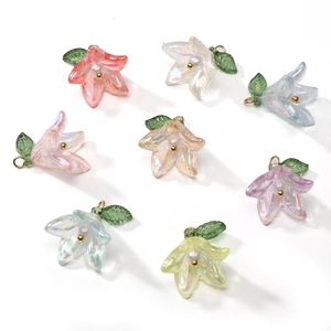 Acrylic lily of the valley flower pendants with pearl centers and green leaves set