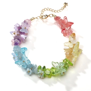 Rainbow gradient glass butterfly and flower bead bracelet with gold star pendant