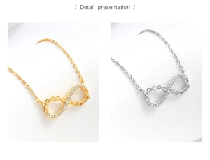 Detailansicht von Unendlichkeit-Anhänger Halsketten in Gold und Silber mit Zirkonia-Steinen