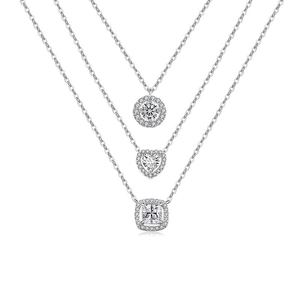 Silver halo necklaces set with round, heart, and square cubic zirconia pendants