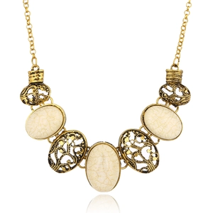 Vintage gold hollow-out oval necklace featuring white ice-crack stones for women
