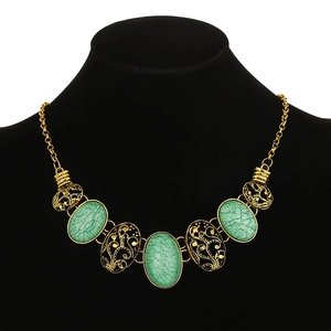 Vintage gold necklace with oval green marble stones and hollow floral charms