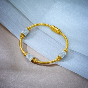 Detail of 18k gold plated snake chain bracelet with magnetic clasp and sparkling crystals