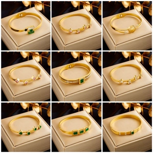 Golden 18k plated stainless steel bangles set with crystals and vintage coin designs