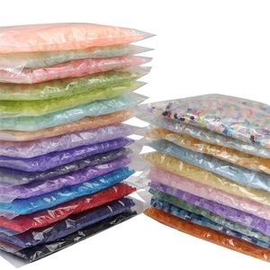 Detailed view of 5mm frosted glass square beads in various colors for jewelry making