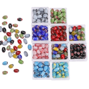 Macro detail of colorful millefiori oval glass beads for DIY jewelry making kits