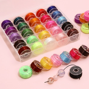 DIY jewelry kit with 24 colors of elastic cord rolls in a transparent storage box organizer