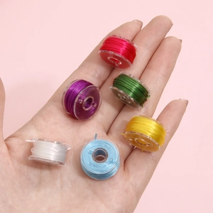DIY colorful elastic cord set for bracelets held in hand showing 6 vibrant colors