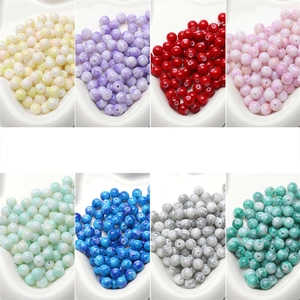 Detail view of 8mm glass porcelain beads in eight assorted colors for DIY jewelry making