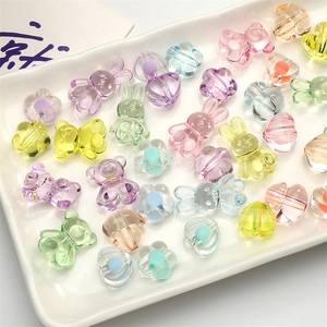 Mélange de perles en acrylique macaron colorées en forme d'animaux pour bijoux DIY