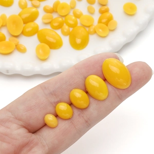 Perline ovali in acrilico giallo per occhi di bambola in cinque diverse misure