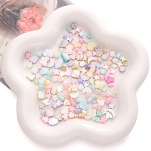 Mix of colorful natural shell beads in moon and heart shapes for DIY jewelry making