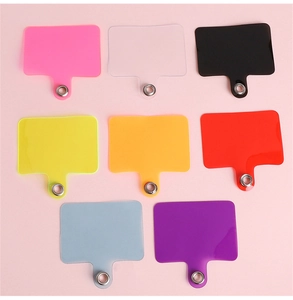 Detailed view of colorful phone lanyard patches in eight vibrant colors with metal rings