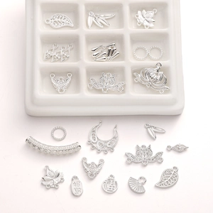 Detailed silver alloy pendants with traditional Chinese engravings and hollow designs