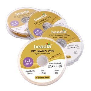 Fil d'acier inoxydable 0,6mm doré clair avec revêtement nylon pour bijoux DIY