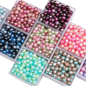 Colorful ABS imitation pearl beads in storage box for DIY jewelry making and crafts
