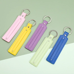 Minimalist faux leather strap keychains with silver rings in multiple vibrant colors