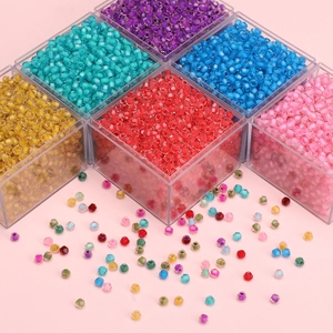 Colorful glass seed beads for DIY jewelry making in a square storage box