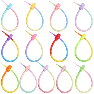 Rainbow gradient silicone plum flower keychain and cable organizer set in various colors