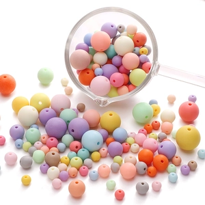 Colorful matte acrylic round beads in assorted macaron colors for DIY jewelry making