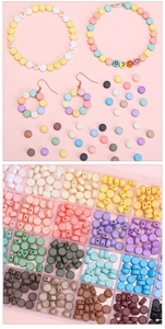 Detailed macro of pastel frosted acrylic beads with heart and star patterns for DIY jewelry