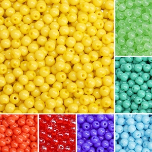 Close-up of colorful 4mm glass seed beads with center holes for DIY jewelry making