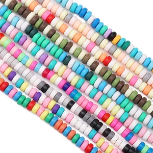 Close-up of 6x3mm colorful polymer clay spacer beads for DIY jewelry making