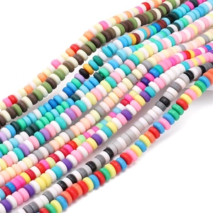 Macro shot of colorful 6x3mm flat polymer clay heishi beads for DIY jewelry making
