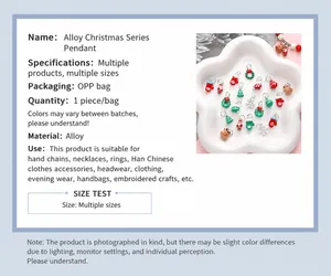 Macro view of festive alloy Christmas charms in a white tray for DIY jewelry projects