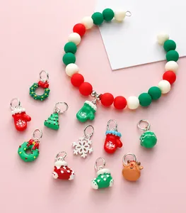 Christmas DIY bracelet with festive alloy pendants including Santa, tree, and snowflake