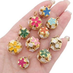 Handcrafted cloisonne hollow metal bell beads in colorful floral designs for DIY jewelry