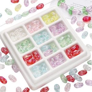 Colorful tulip-shaped acrylic beads for DIY jewelry making displayed on a white tray