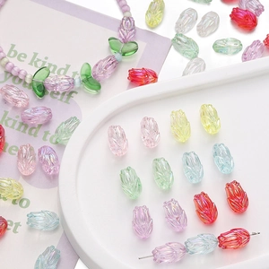 Macro shot of colorful acrylic tulip beads with aurora coating for DIY jewelry making