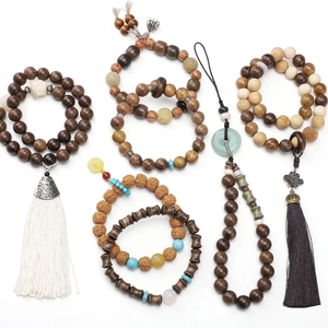 Zen style natural wood bead bracelets with silk tassels and traditional Chinese knots